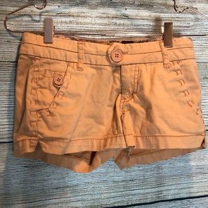 Peach colored shorts